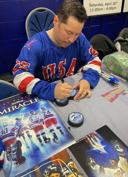 USA Hockey Puck Signed by Billy Schneider ( Buzz Schneider ) -Black